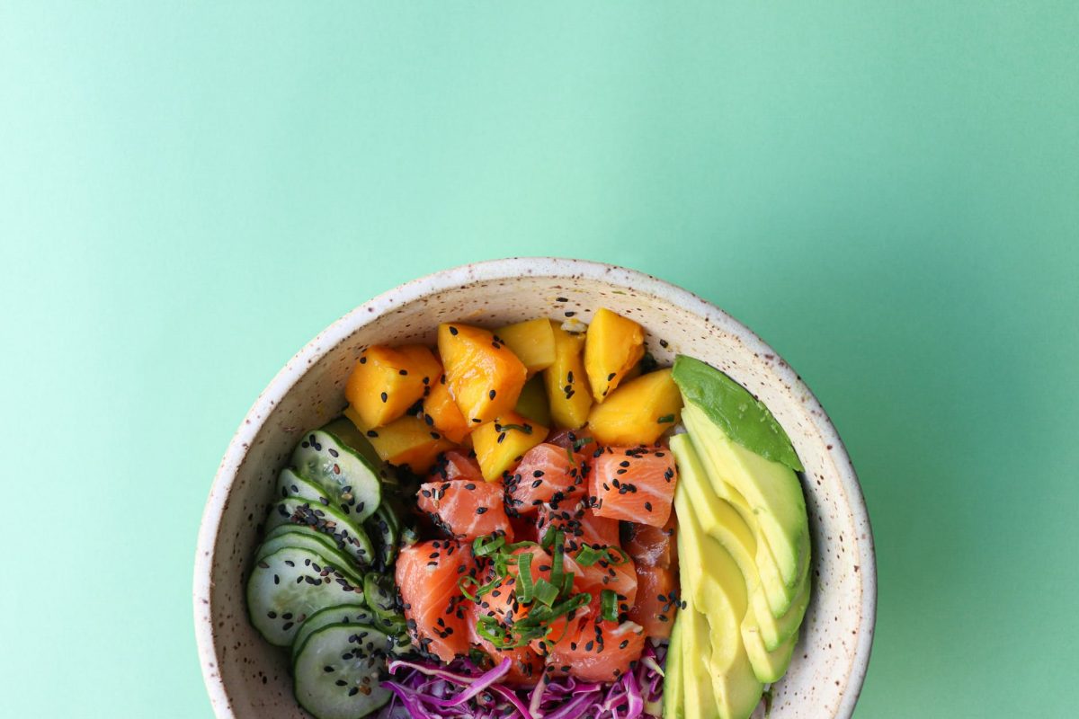 bowl with healthy hawaiian dish on bright background